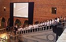 a children's choir welcomes the Finalists